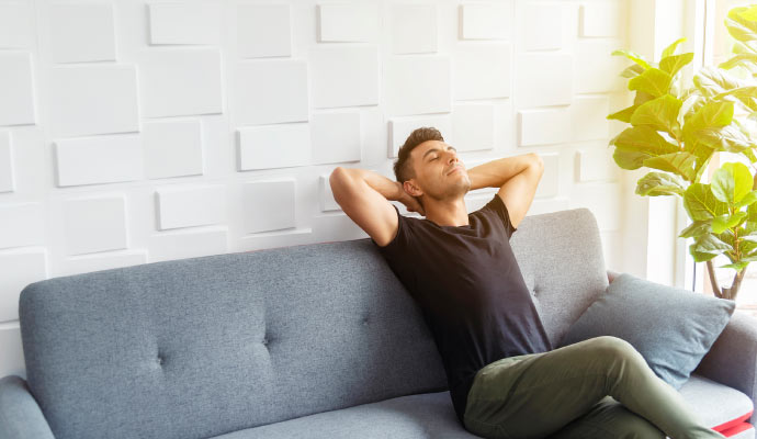 Person relaxing in a clean and bright room