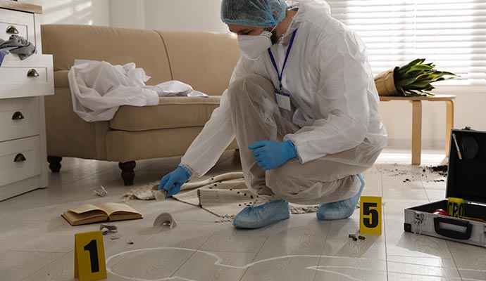 white colored victim crime outline on a tile floor