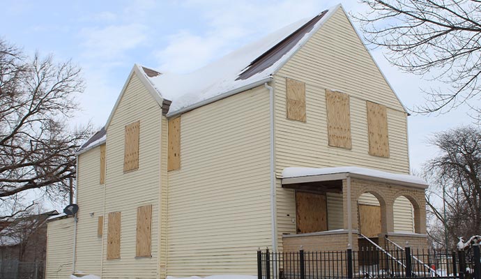 a boarded up house