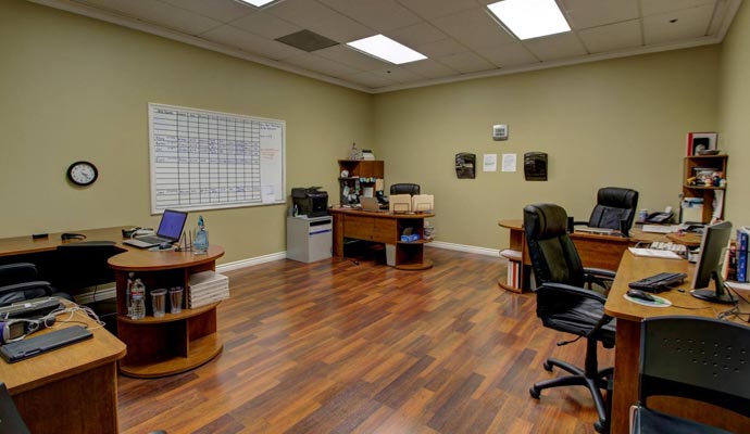  A clean office room with wooden flooring