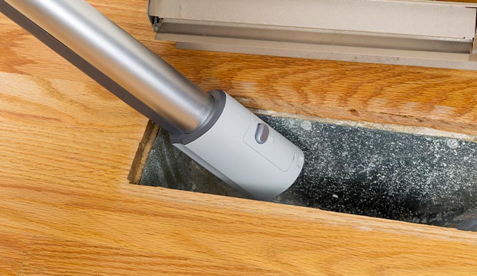 Duct cleaning using a vacuum cleaner