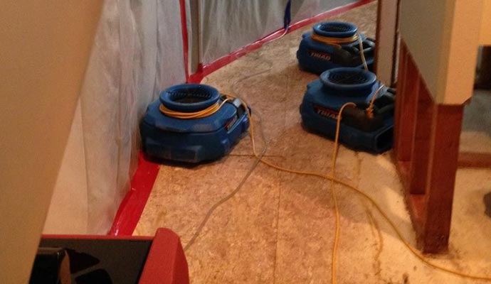 Water Damage Restoration with equipment