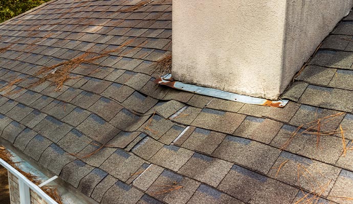 a damaged house roof