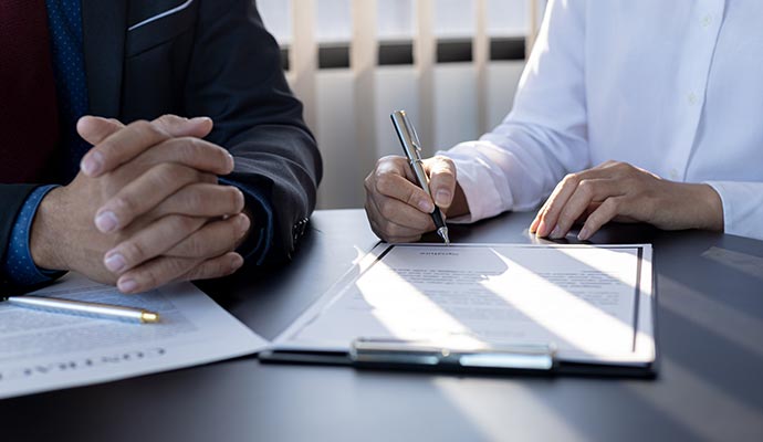 Person signing a document