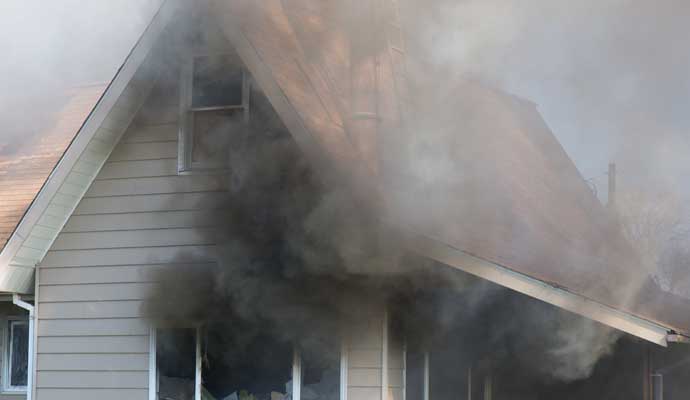 smoke coming out of a house