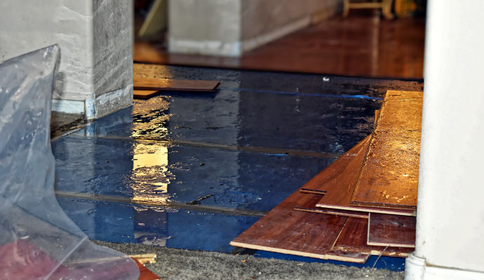 a room floor flooded with water