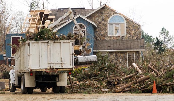 Debris removal from a storm damaged house