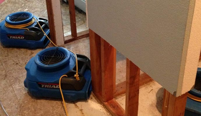 Water damage restoration with equipment