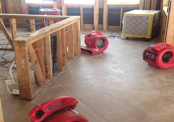 water damage restoration with dehumidifier