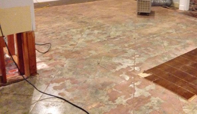 prolonged exposure to moisture caused floor discoloration