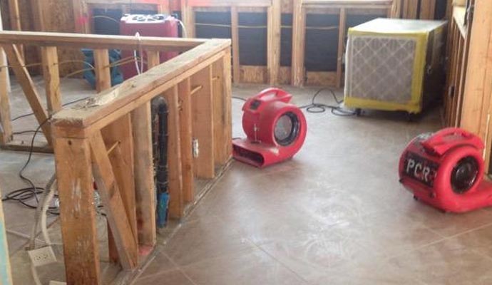 Water damage restoration with equipment